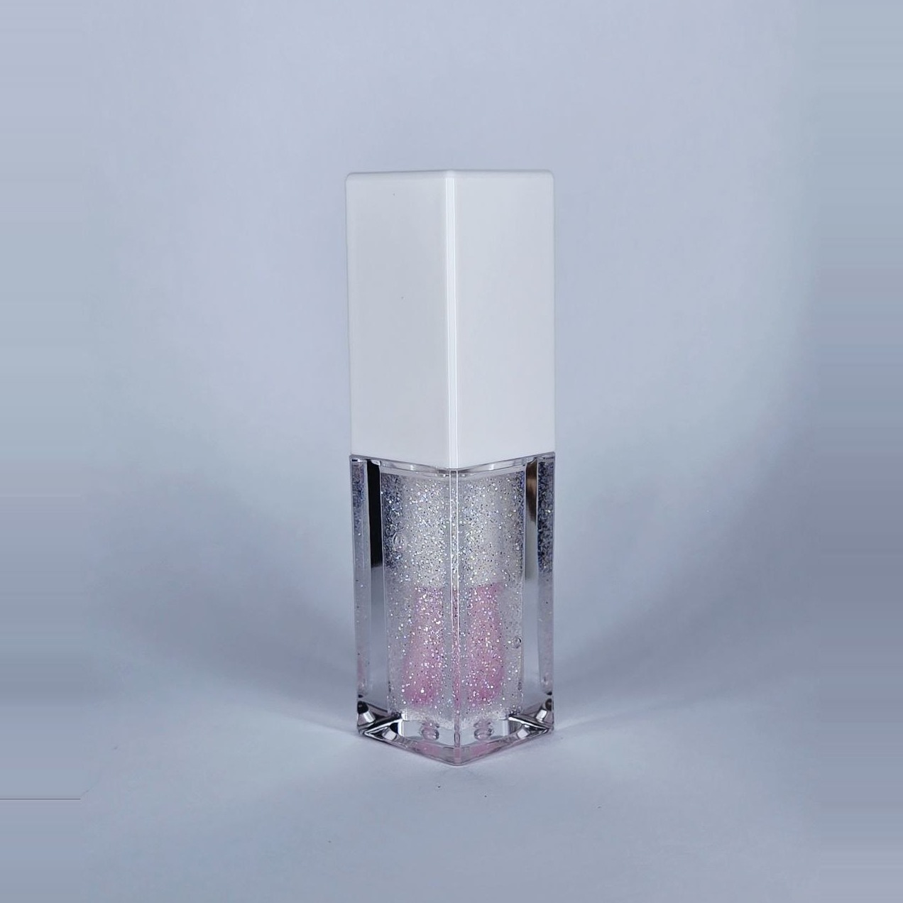 Glimmer Kiss color-changing lip gloss, side view