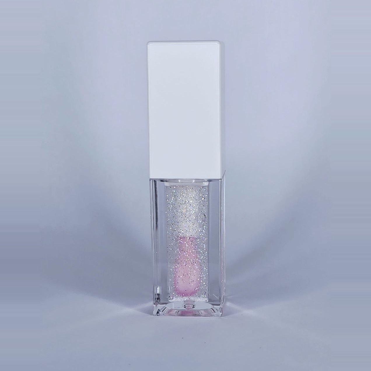Glimmer Kiss color-changing lip gloss, front view