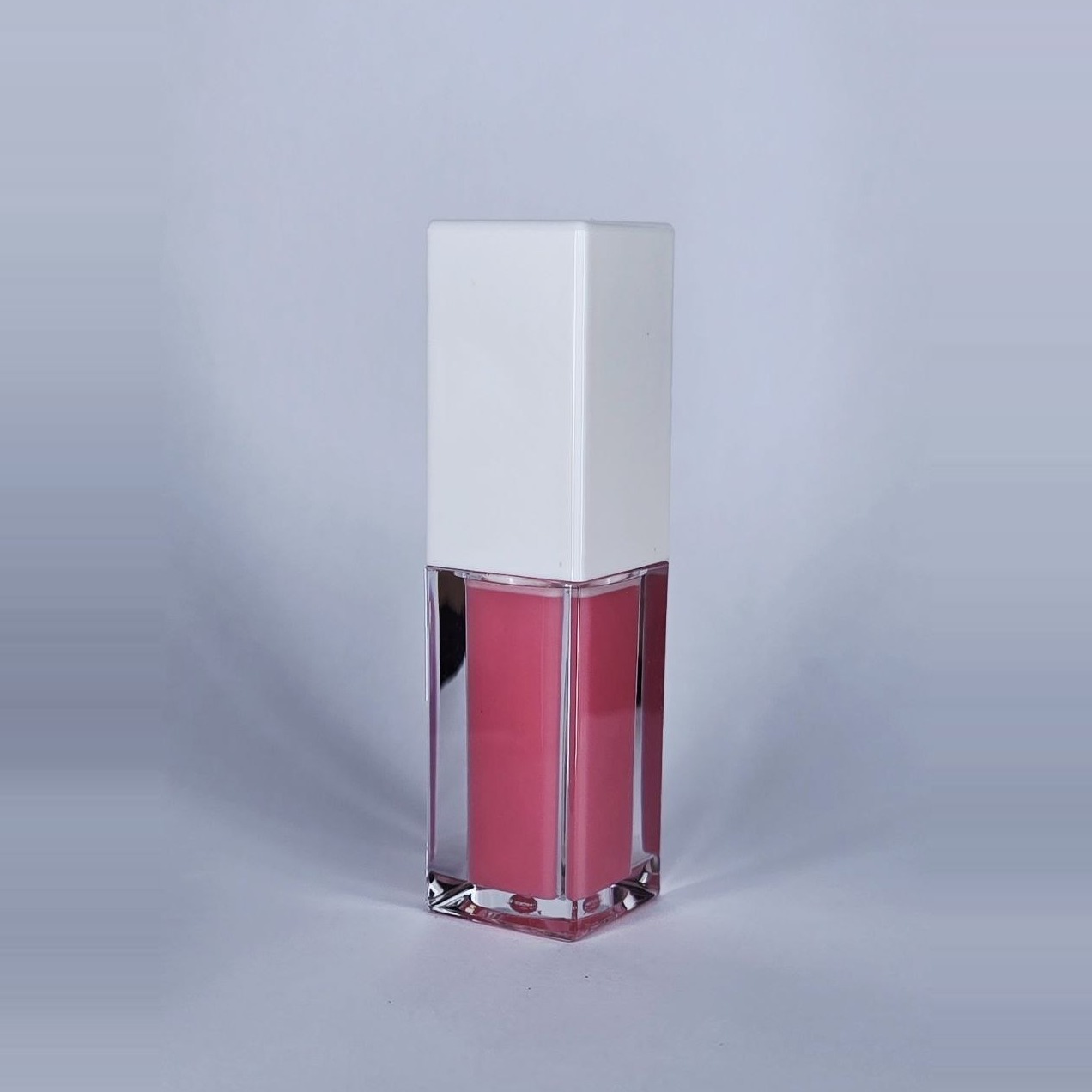 Pink Paradise pink lip gloss, side view
